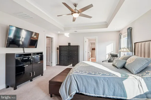 a bathroom with a double vanity sink and mirror