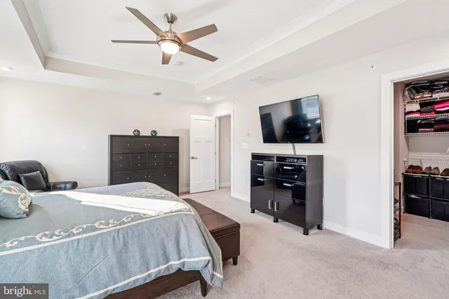 a spacious bathroom with a double vanity sink mirror and double