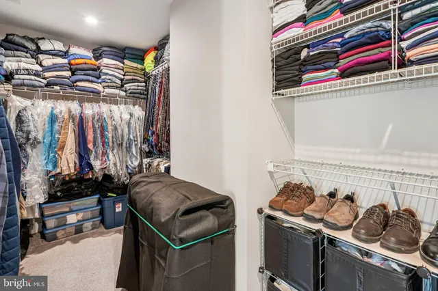 a view of a hallway view with three rooms