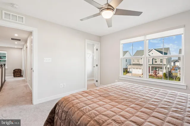 a view of workspace with wooden floor windows