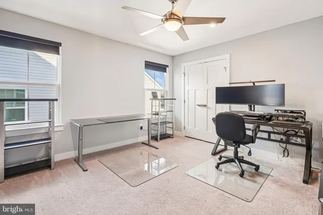 a workspace with furniture hardwood and a window