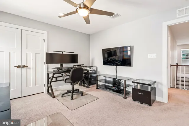 a room with furniture and window