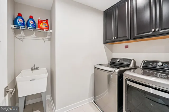 a room with furniture projector and screen