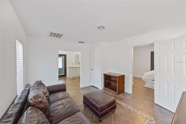 a living room with furniture and a couch