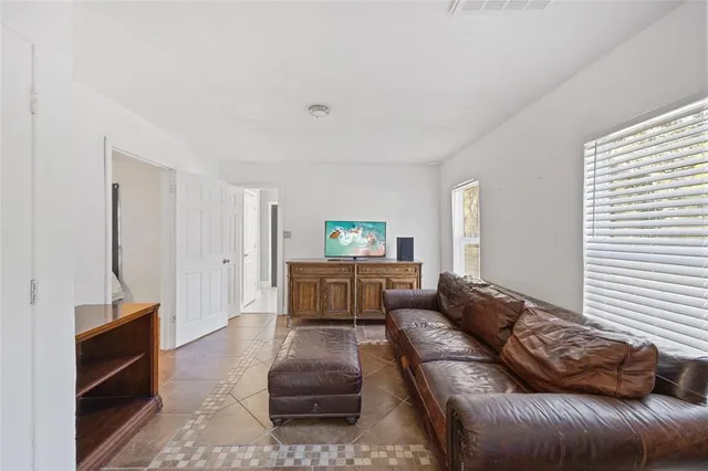 a living room with furniture and a couch