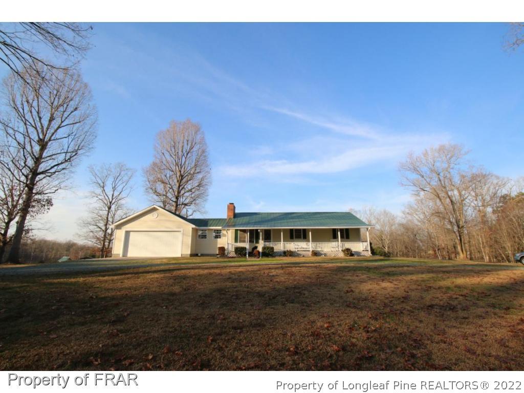 748 Wadsworth Road Carthage, NC 28327 - Photo 1 of 36 a view of house with outdoor space