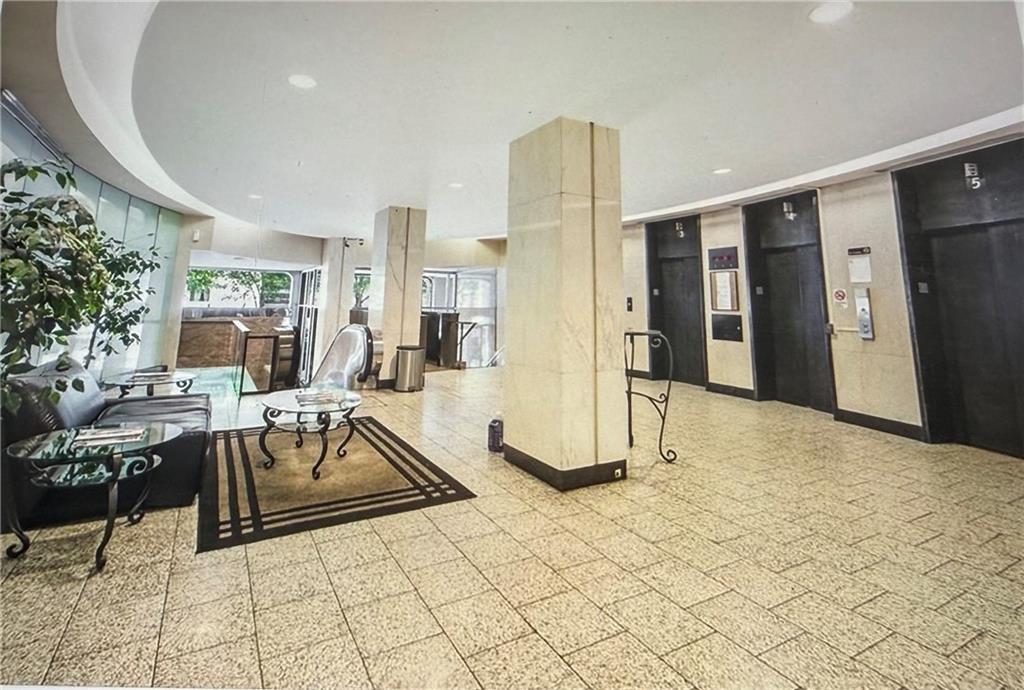 20 Marietta Street Northwest, Unit 10F Atlanta, GA 30303 - Photo 13 of 17 a view of a living room and entry way