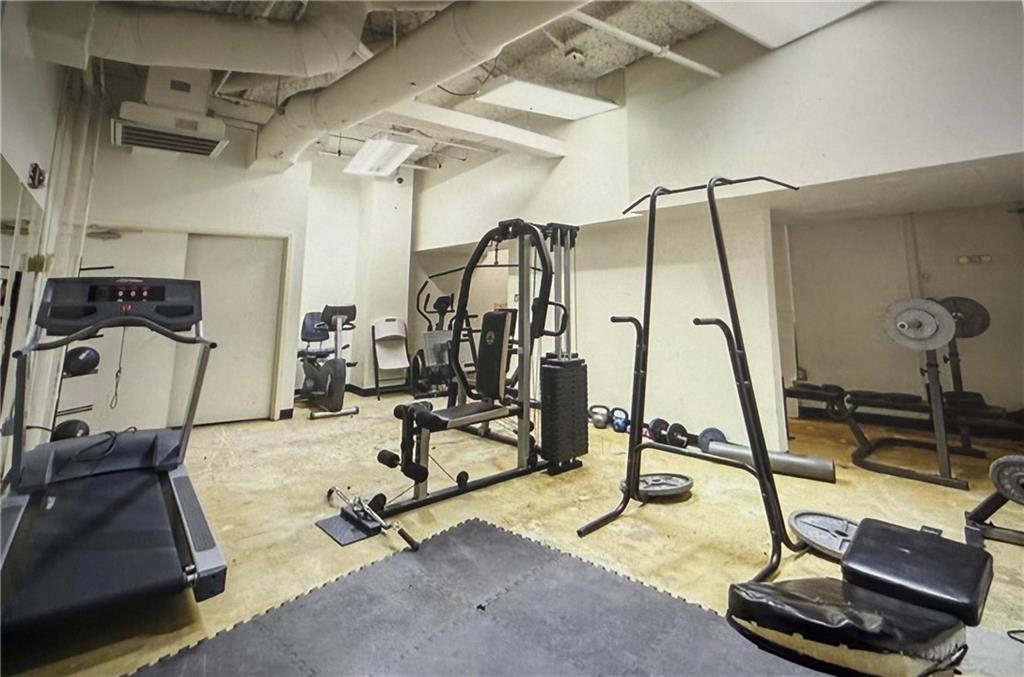 20 Marietta Street Northwest, Unit 10F Atlanta, GA 30303 - Photo 16 of 17 a room with gym equipment