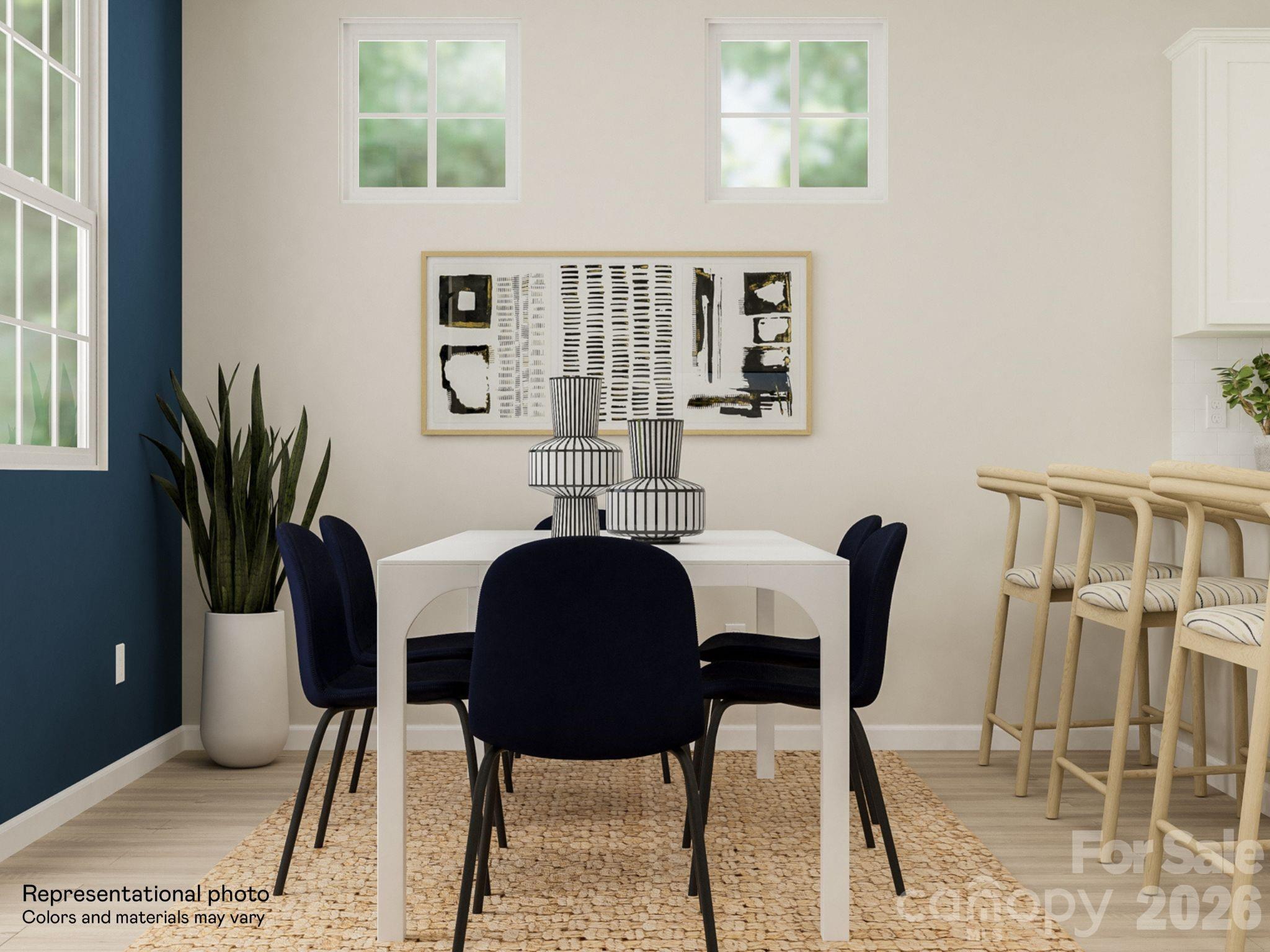 7002 Juneberry Way Maiden, NC 28650 - Photo 12 of 25 a view of a dining room with furniture and a potted plant