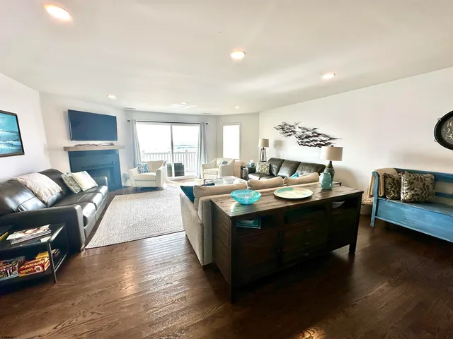 a living room with a couch and a large window