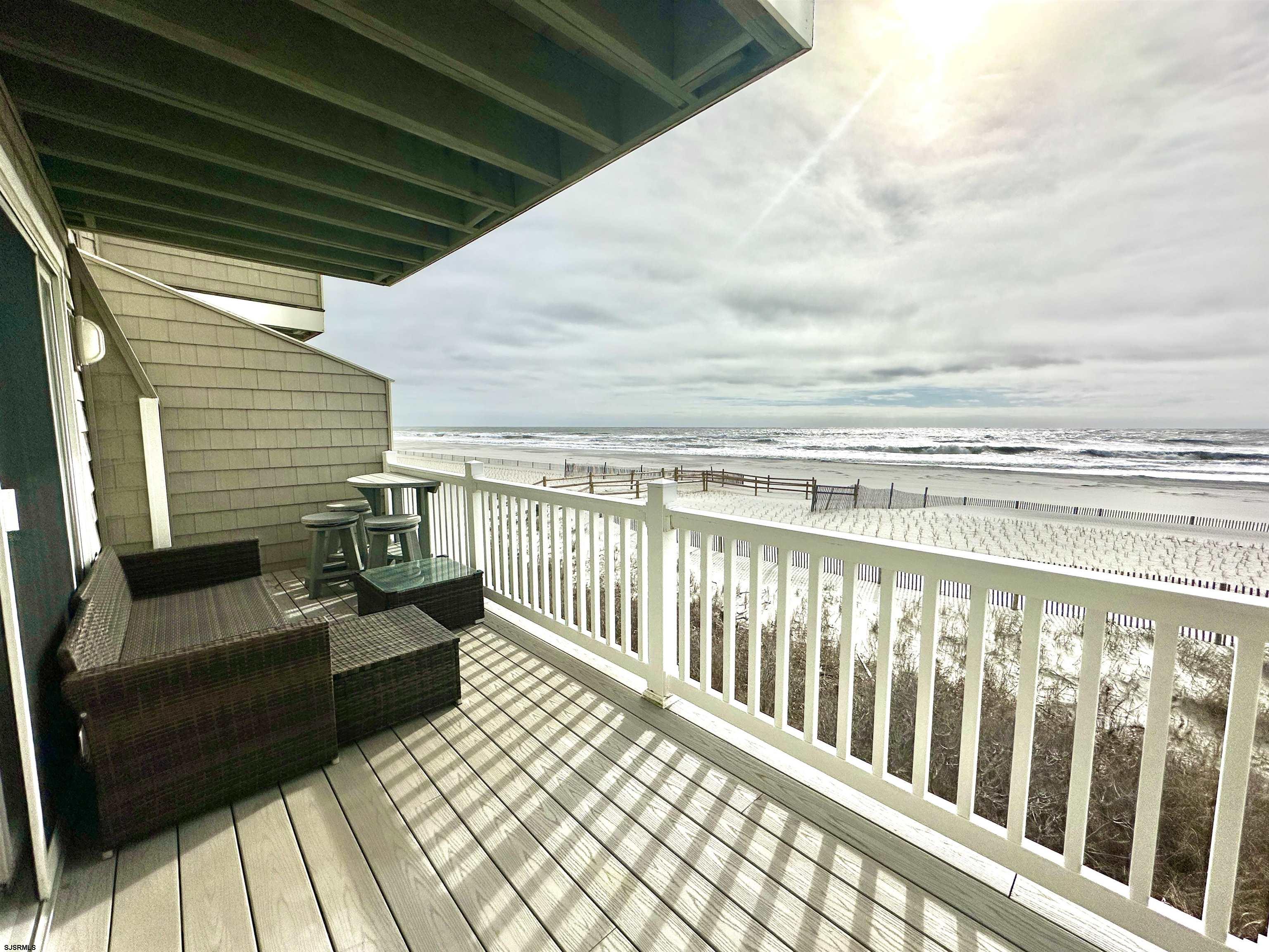 612 East Brigantine Avenue, Unit 612 Brigantine, NJ 08203 - Photo 13 of 29 a view of a balcony with furniture