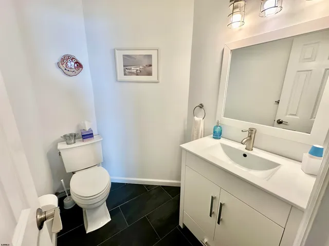 a bathroom with a sink and a toilet