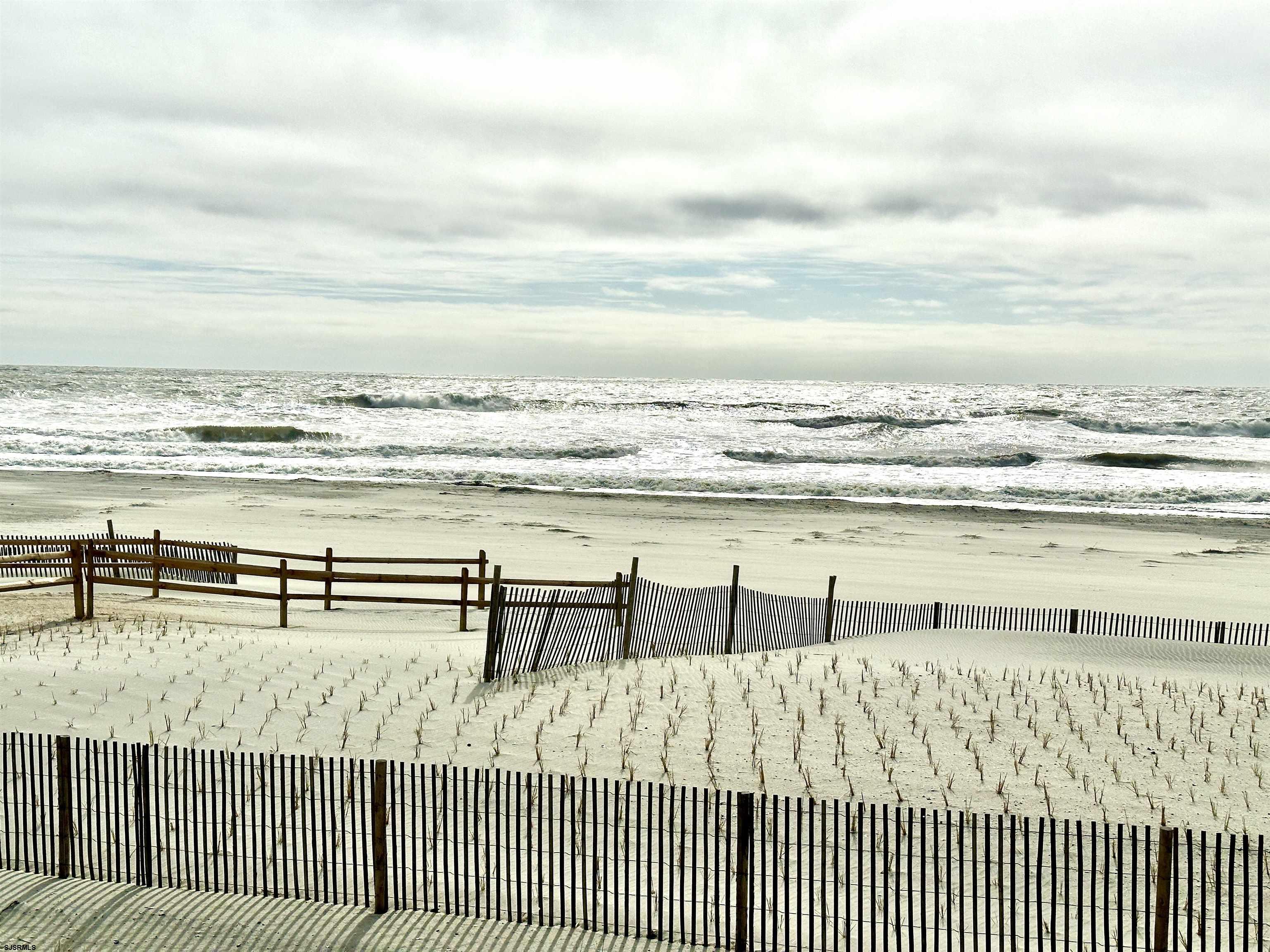 612 East Brigantine Avenue, Unit 612 Brigantine, NJ 08203 - Photo 27 of 29 a view of ocean with beach