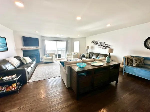 a living room with a couch and a large window
