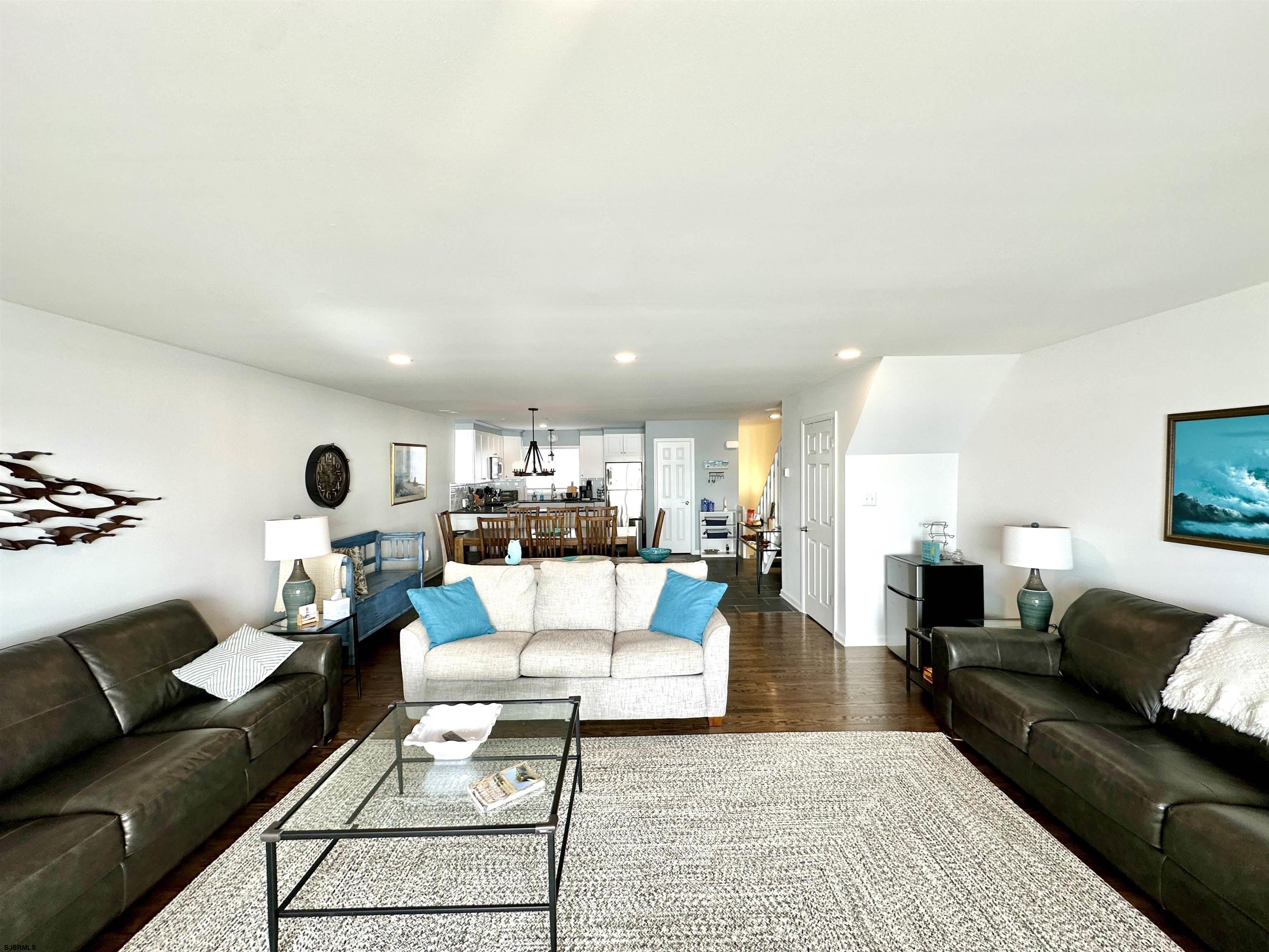 612 East Brigantine Avenue, Unit 612 Brigantine, NJ 08203 - Photo 9 of 29 a living room with furniture and a table