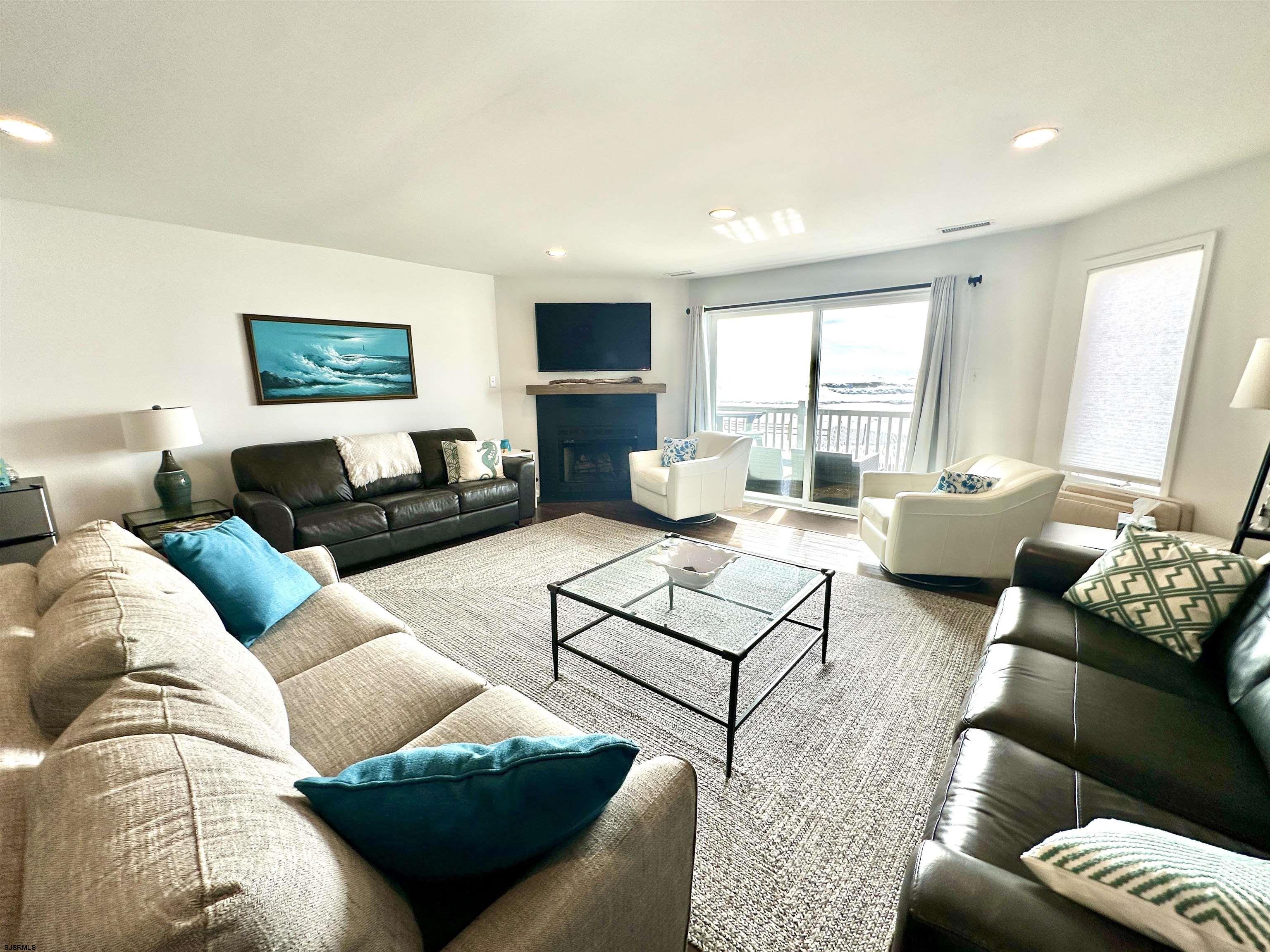 612 East Brigantine Avenue, Unit 612 Brigantine, NJ 08203 - Photo 10 of 29 a living room with furniture and a window