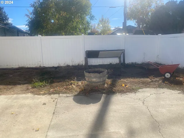 a view of a backyard of the house