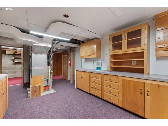 a balcony with table and chairs