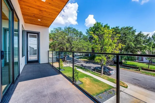 a view of a balcony with lake view