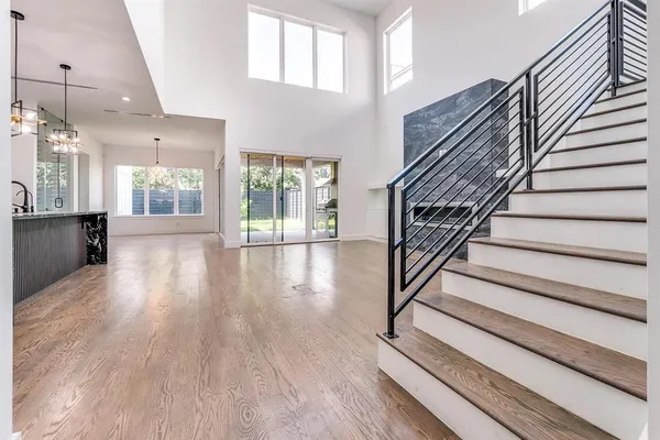 a view of an entryway with wooden floor