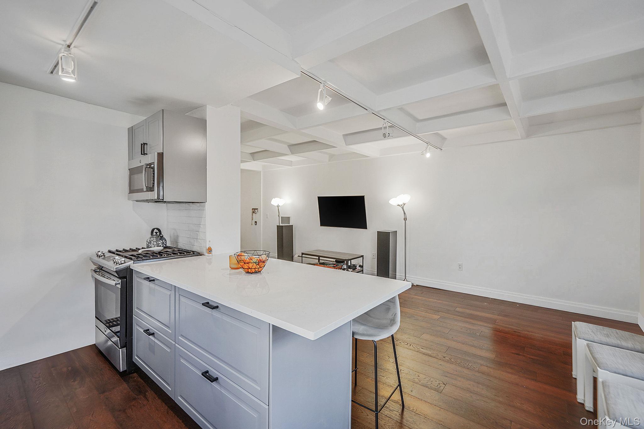 144-66 Village Road, Unit 75D Queens, NY 11435 - Photo 18 of 19 a view of a workspace with furniture