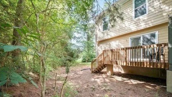 a view of backyard with a small cabin