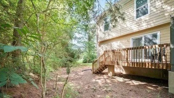 a view of backyard with a small cabin
