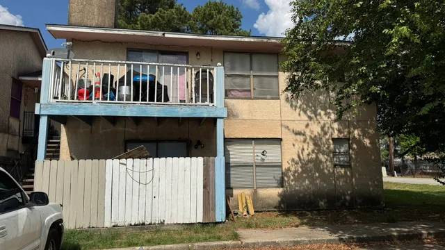 a view of a house with a walls