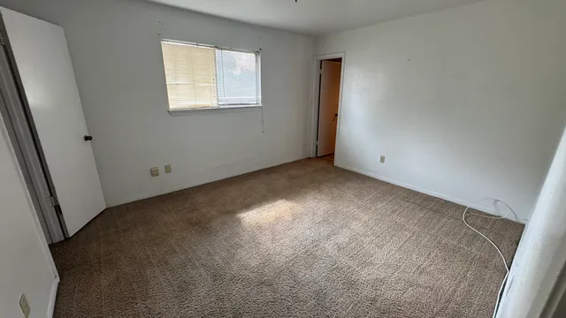 an empty room with a window