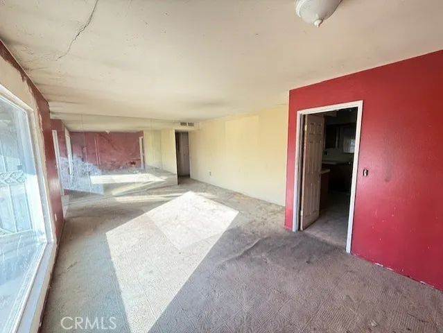 a kitchen with a refrigerator a stove top oven a sink and dishwasher