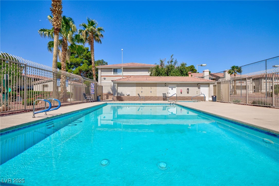 7300 West Pirates Cove Road, Unit 2038 Las Vegas, NV 89145 - Photo 22 of 26 Community pool featuring a patio area