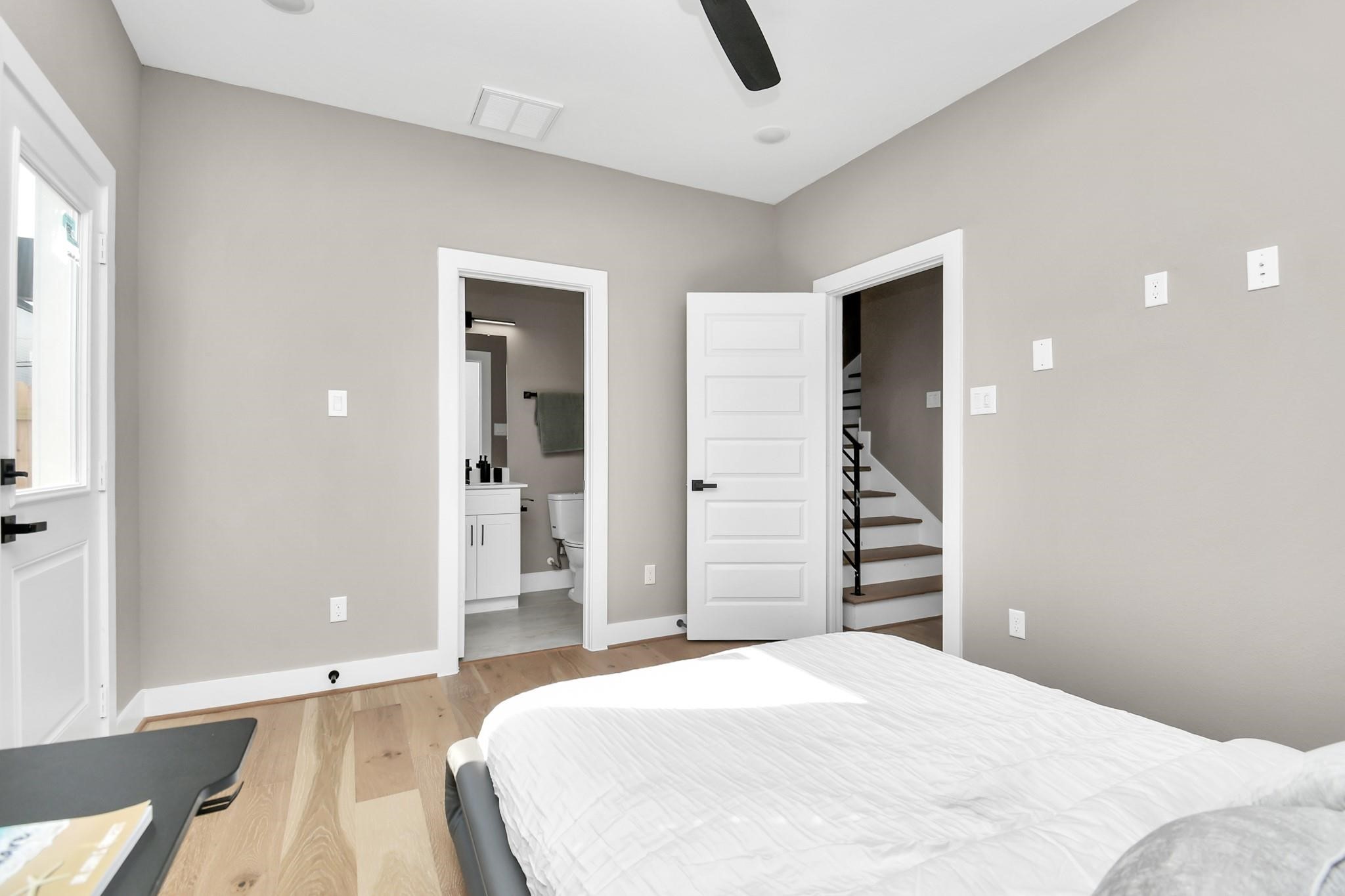 316 Thornton Road, Unit A Houston, TX 77018 - Photo 2 of 27 a bedroom with a bed and a dresser