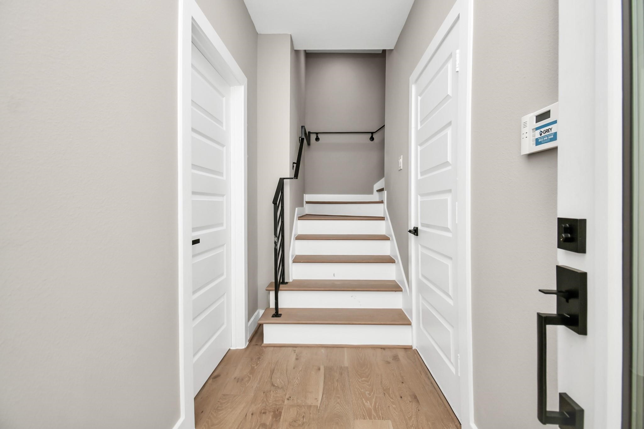 316 Thornton Road, Unit A Houston, TX 77018 - Photo 3 of 27 a view of a hallway with wooden floor and entryway