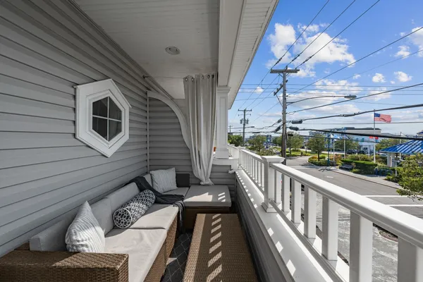 a view of a porch with furniture