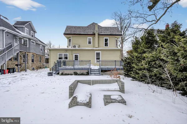 a view of a back yard of the house