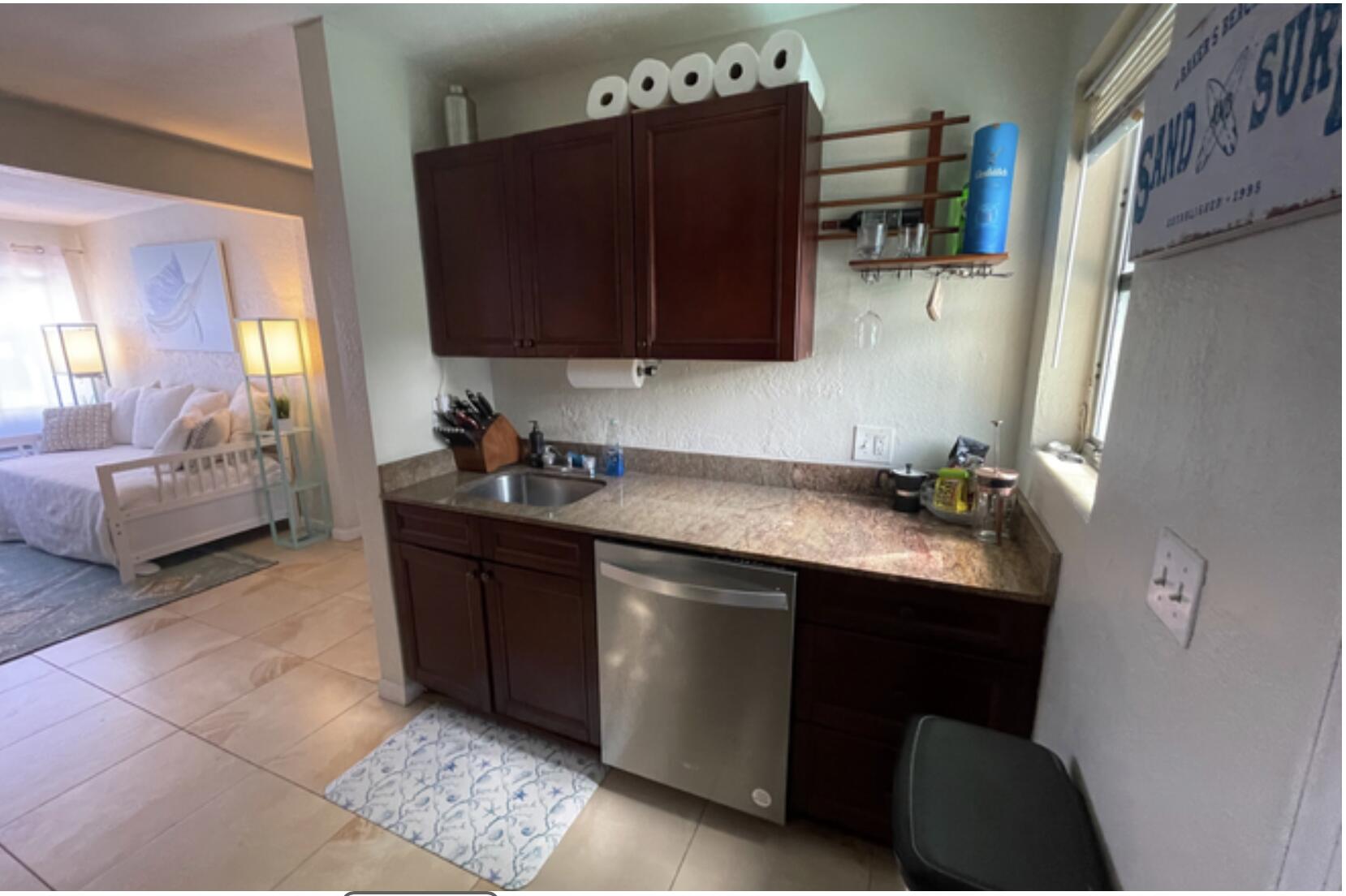 350 Northwest 5th Avenue Delray Beach, FL 33444 - Photo 7 of 15 a kitchen with a sink cabinets and window