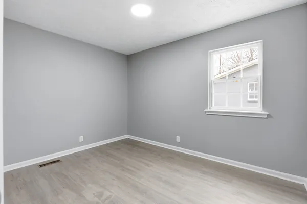 an empty room with a window