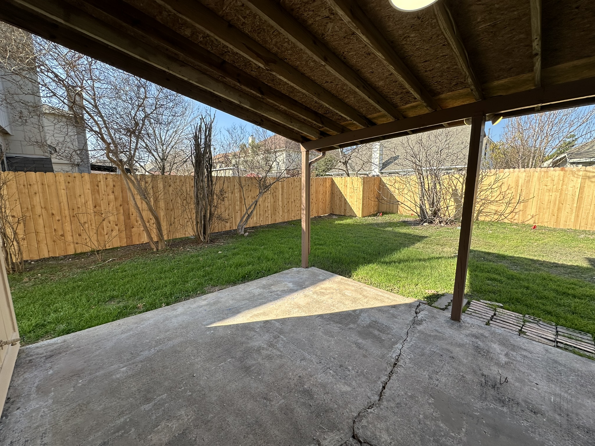 814 Smoke Signal Pass Pflugerville, TX 78660 - Photo 13 of 29 Fenced backyard with a patio