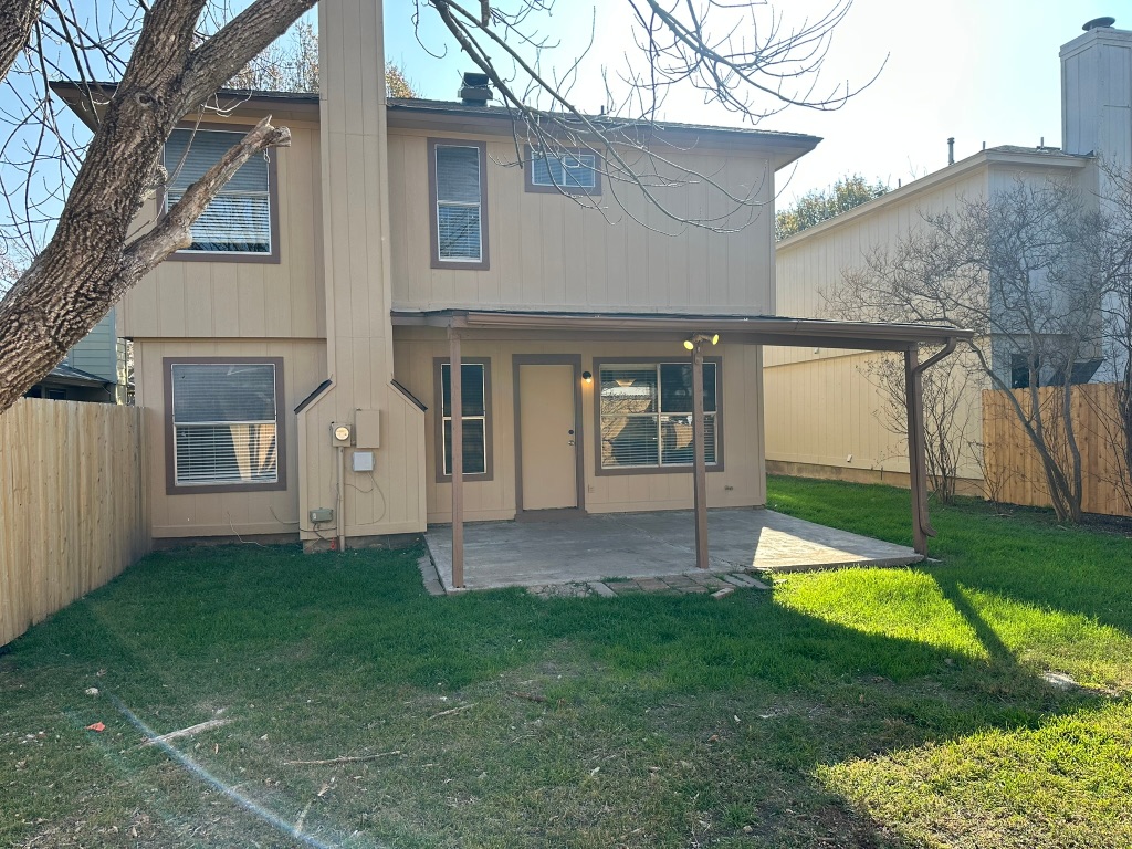 814 Smoke Signal Pass Pflugerville, TX 78660 - Photo 15 of 29 Rear view of property with a fenced backyard and a patio area