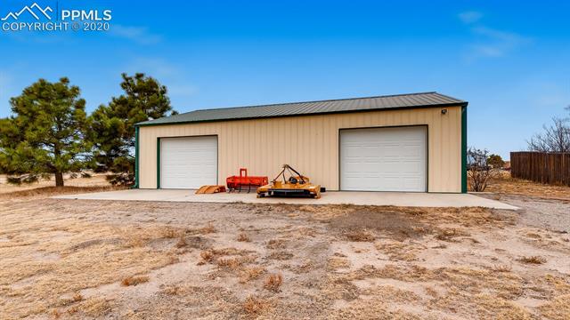 17570 Sage Crest Road Peyton, CO 80831 - Photo 24 of 25 Huge man cave garage/workshop. Room for another garage door