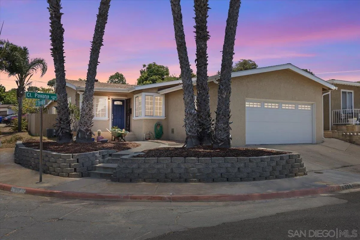 6295 Calle Pavana San Diego, CA 92139 - Photo 27 of 27 a front view of a house with garden