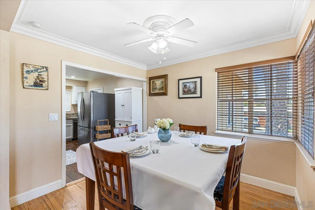 6295 Calle Pavana San Diego, CA 92139 - Photo 8 of 27 a view of a dining room with furniture and window