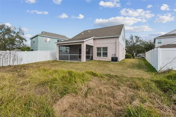 an aerial view of a house with a garden