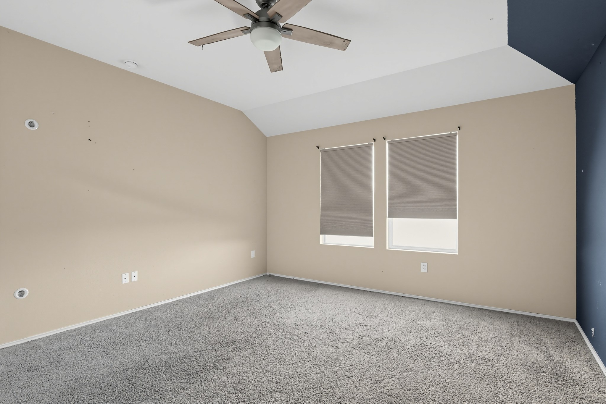 11810 Pyrite Road Manor, TX 78653 - Photo 23 of 38 Plush carpeting and vaulted ceilings define this comfortable interior space.