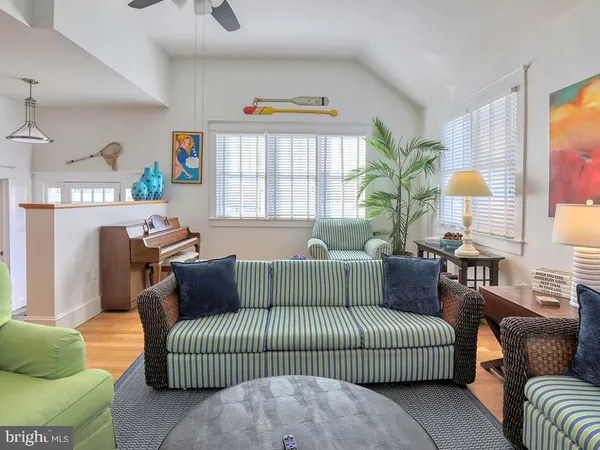 a kitchen with stainless steel appliances a sink a stove top oven a counter space and cabinets