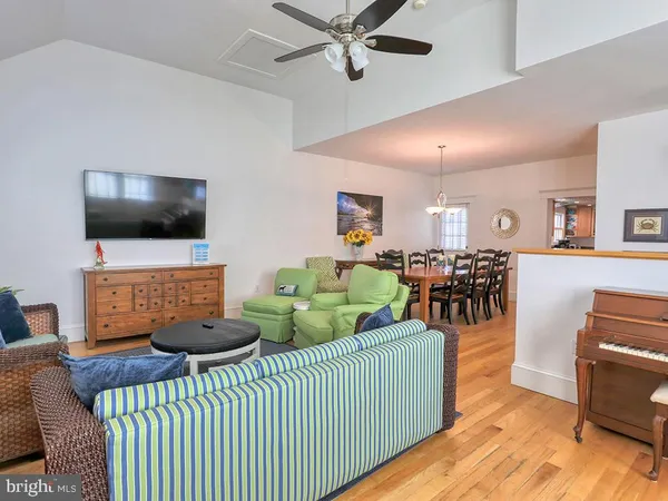 a kitchen with stainless steel appliances granite countertop a refrigerator sink and cabinets