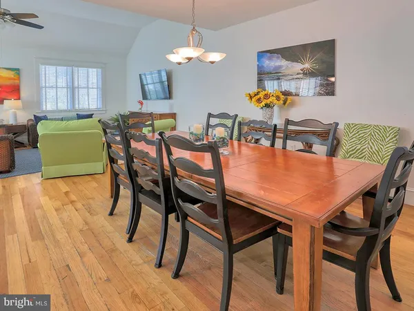 a kitchen with stainless steel appliances granite countertop sink stove and refrigerator