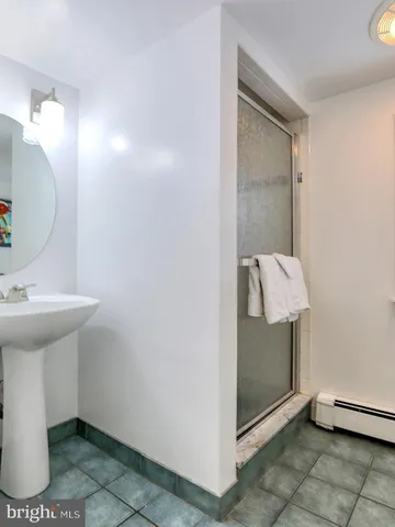 a view of a house with swimming pool and sitting area