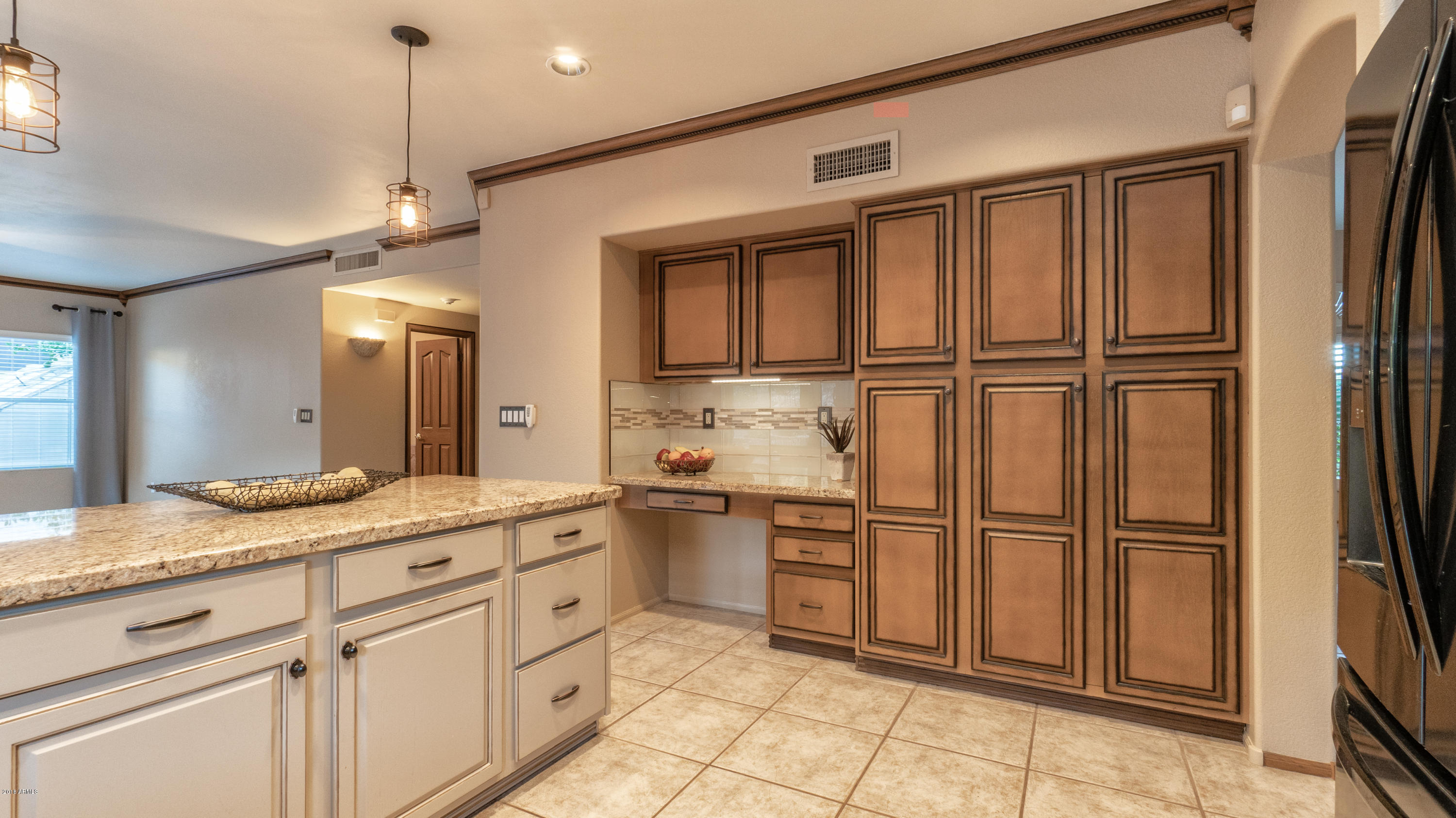 1622 East Nighthawk Way Phoenix, AZ 85048 - Photo 16 of 58 Kitchen Island & Built-in Desk