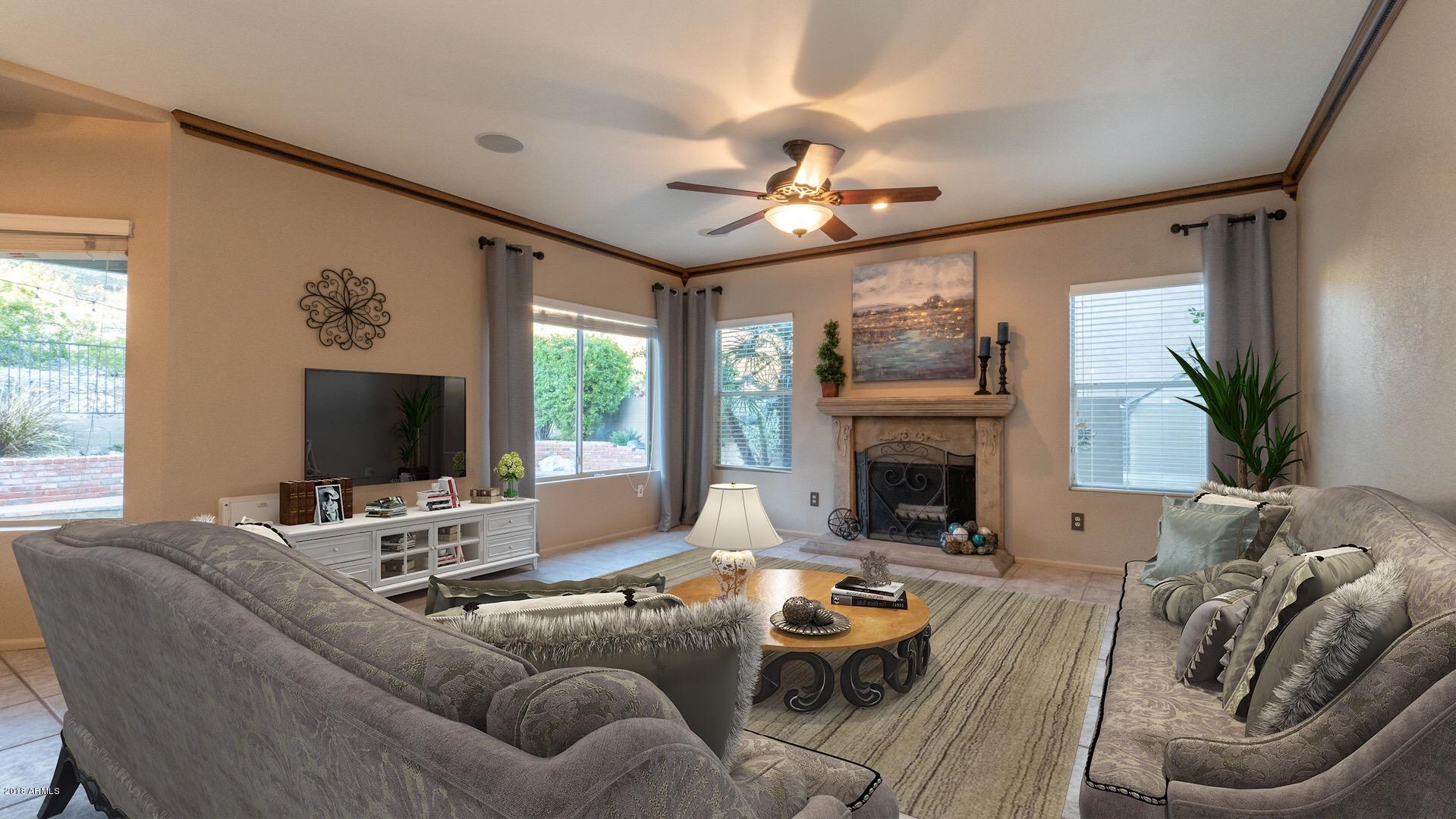 1622 East Nighthawk Way Phoenix, AZ 85048 - Photo 23 of 58 Family Room with Fireplace